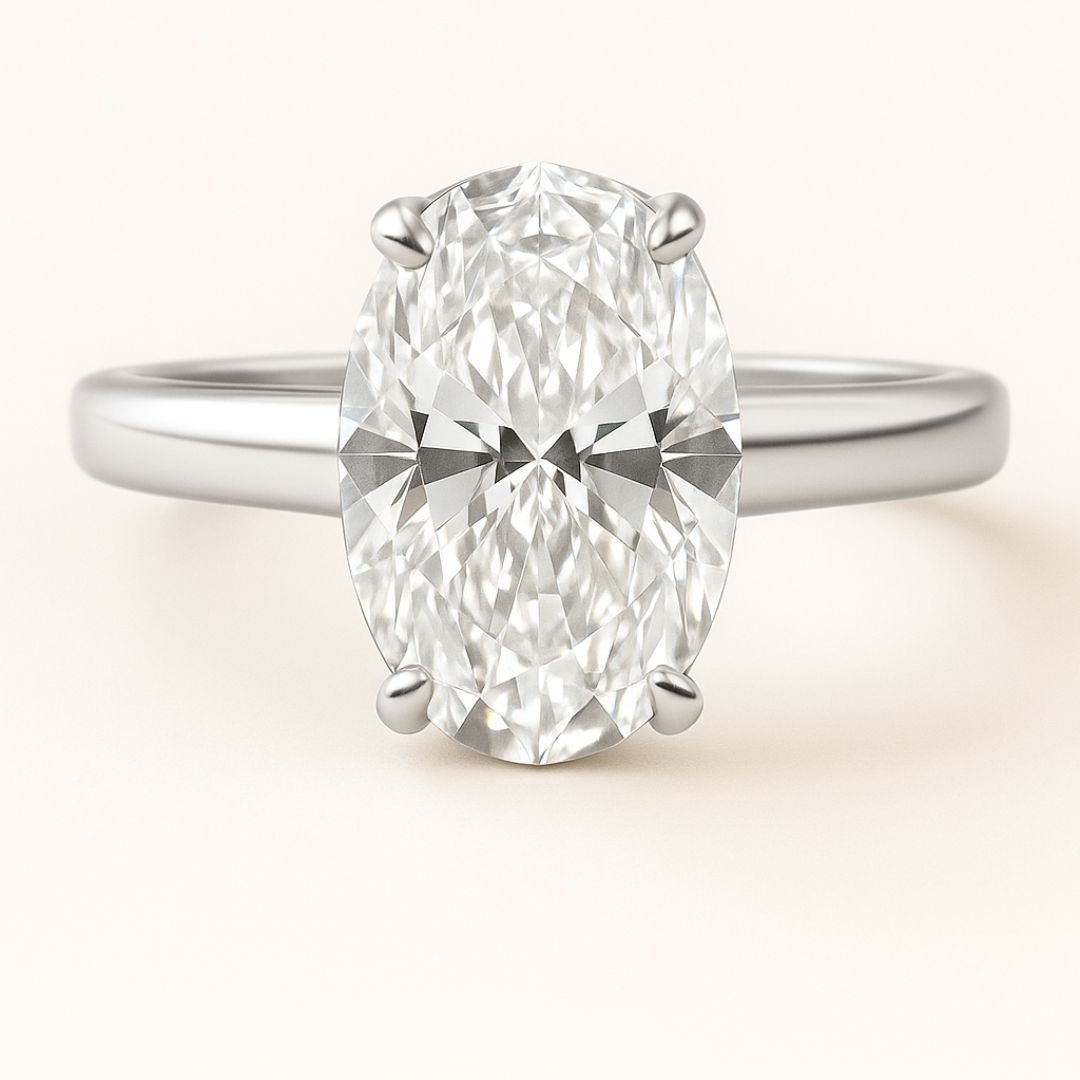 Statement Platinum Oval Diamond Ring - The Nadira Ring - Dainty London platinum diamond ring, oval diamond ring, lab-grown diamond, modern vintage jewellery, engagement ring, luxury diamond ring, ethical diamond ring, special occasion gift, anniversary ring, sustainable jewellry, GIA certified diamond, statement jewelry, timeless engagement ring