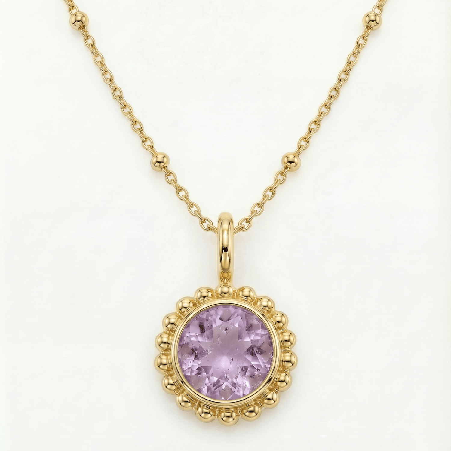 Sunburst necklace with a glowing light purple amethyst, barnacle-textured bezel detail. Ocean-inspired statement jewellery. Selfridges Style Birthday Gifts