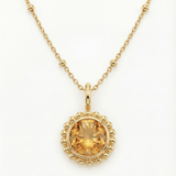 Sunburst necklace with a warm sunset-orange citrine and barnacle-textured bezel detail. Dainty ocean-inspired jewellery with coastal charm. Birthday Gifts