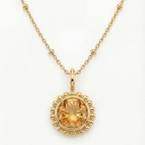 Sunburst necklace with a warm sunset-orange citrine and barnacle-textured bezel detail. Dainty ocean-inspired jewellery with coastal charm. Birthday Gifts
