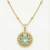 Sunburst necklace with a green quartz, barnacle-textured bezel detail. Ocean-inspired statement jewellery with coastal charm. Alex Monroe Style Birthday Gifts For Her