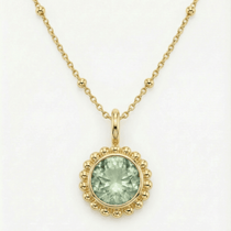 Sunburst necklace with a green quartz, barnacle-textured bezel detail. Ocean-inspired statement jewellery with coastal charm. Alex Monroe Style Birthday Gifts For Her