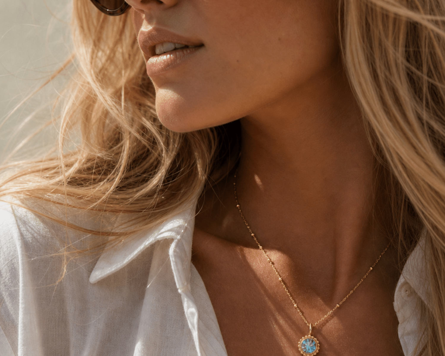 Sunburst necklace with a sparkling sky blue topaz. Ocean-inspired statement jewellery with coastal charm. Monica Vinader-Style jewellery, Birthday Gifts For Her