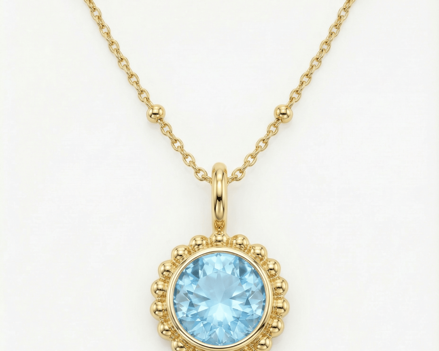 Sunburst necklace with a sparkling sky blue topaz. Ocean-inspired statement jewellery with coastal charm. Monica Vinader-Style jewellery, Birthday Gifts For Her