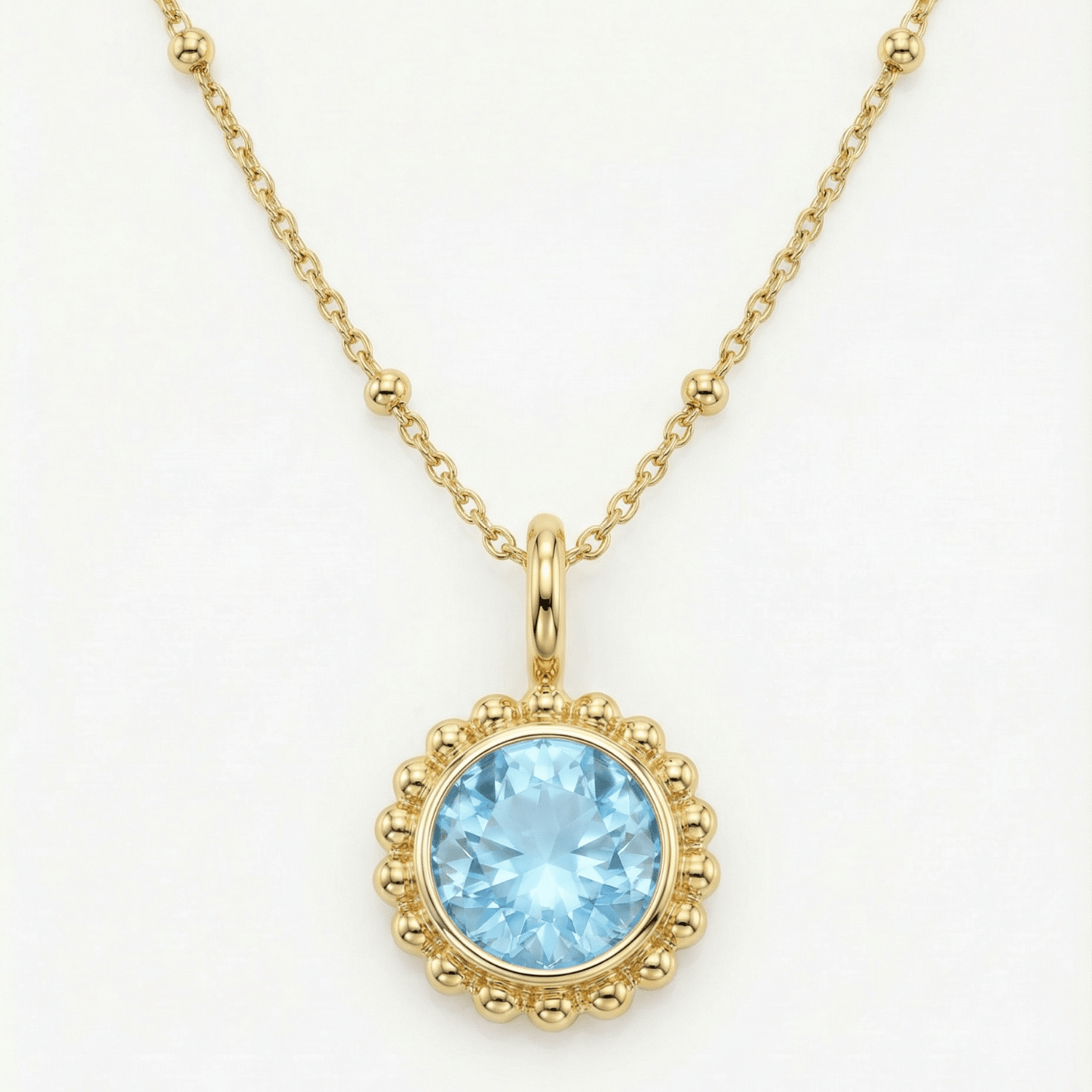 Sunburst necklace with a sparkling sky blue topaz. Ocean-inspired statement jewellery with coastal charm. Monica Vinader-Style jewellery, Birthday Gifts For Her