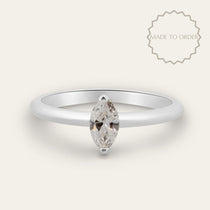 platinum diamond ring, water inspired jewellery, engagement ring women, anniversary gift jewellery, delicate diamond band, marquise diamond ring, handmade platinum ring, wedding jewelry, elegant statement ring, luxury solitaire diamond, special occasion gift, modern engagement ring, gemstone anniversary ring