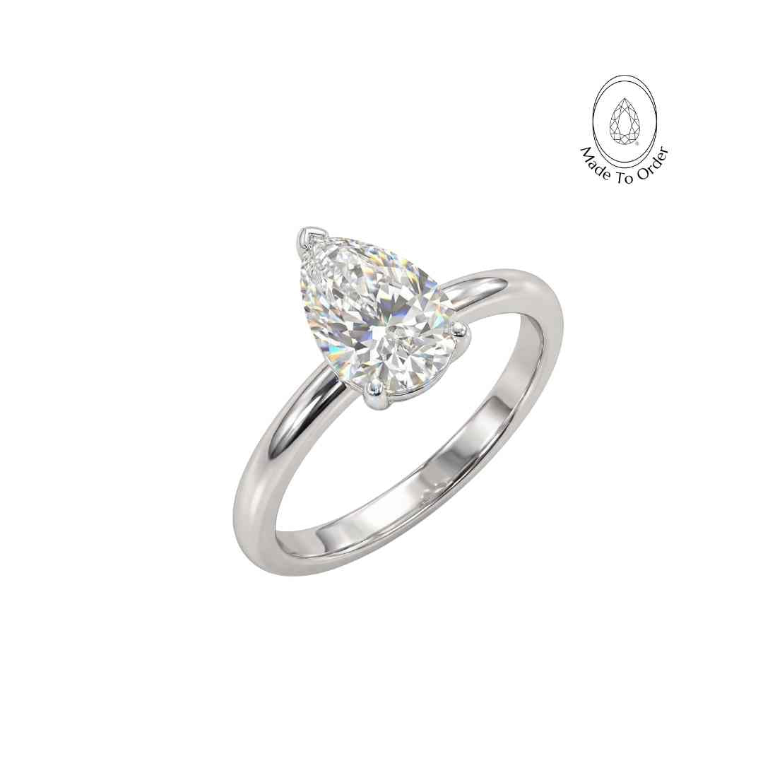 the Yara Ring - Engagement Rings UK under 1000 - Dainty London platinum pear diamond ring, ethical lab-grown diamond, white gold engagement ring, modern layered ring, boho pearl ring, sustainable luxury jewellery, handmade London ring, gift for her, contemporary estate ring, unique statement ring, natural brilliance jewellry, luxury ethical jewelry, layered stacking rings